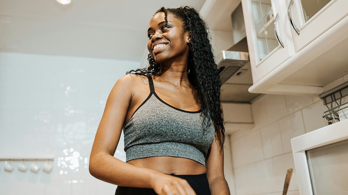 Healthy woman in kitchen