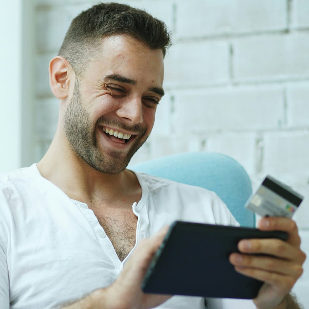 Man shopping online for wellness products