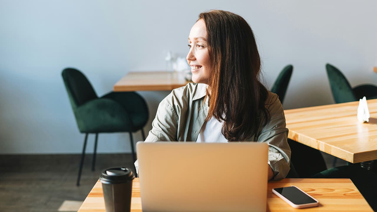 Entrepreneur working on their telehealth business from a modern workspace