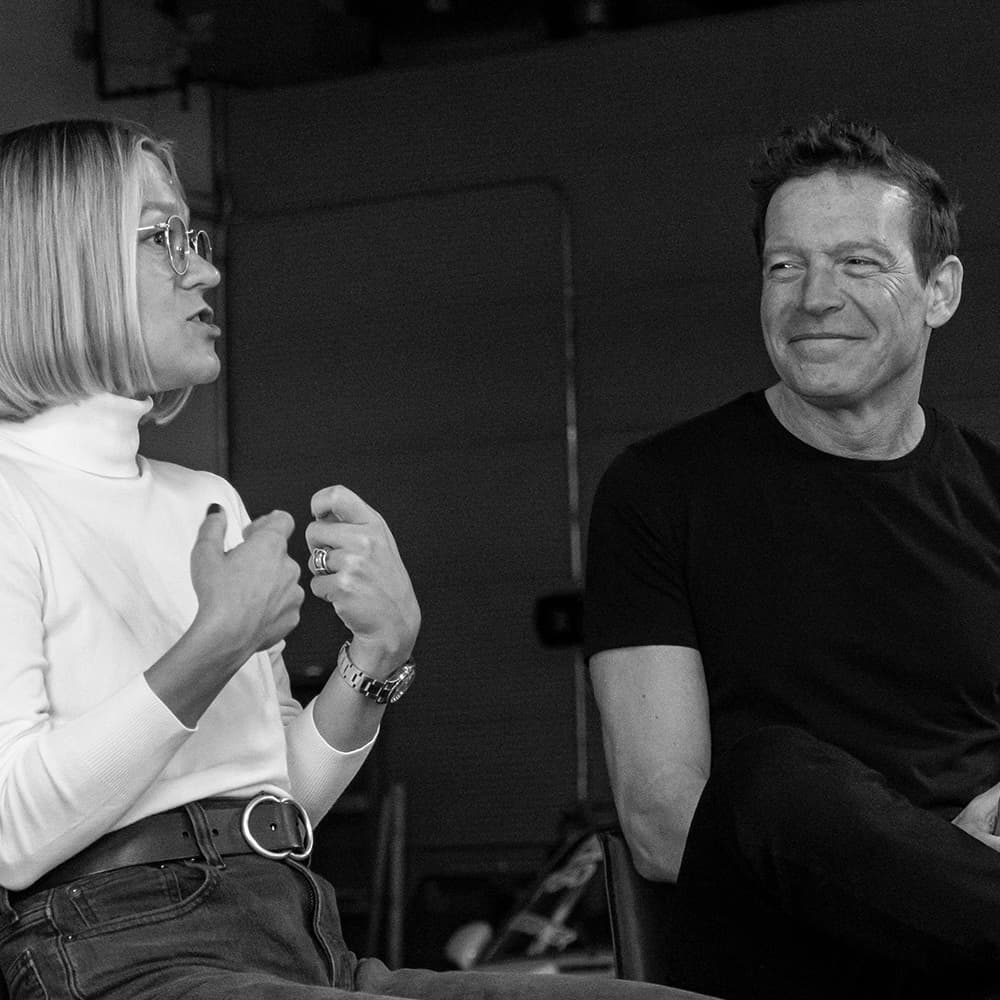 Teligant co-founders at a speaking event